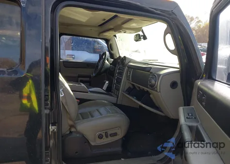 2003 Hummer H2 z USA, uszkodzony, nr VIN 5GRGN23U73H114611